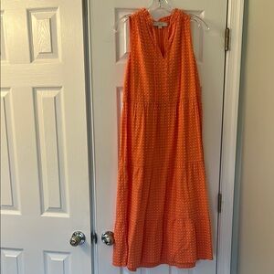 Salmon/orange with white polka dots. Sleeveless Dress